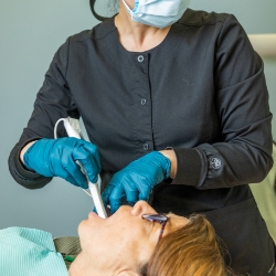 Woman receiving dental exam