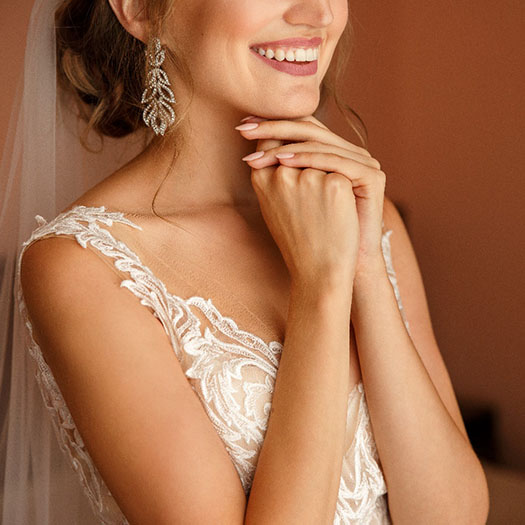 Bride smiling in her wedding dress