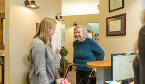 Senior woman smiling in a dental office
