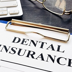 Dental insurance form resting on a table