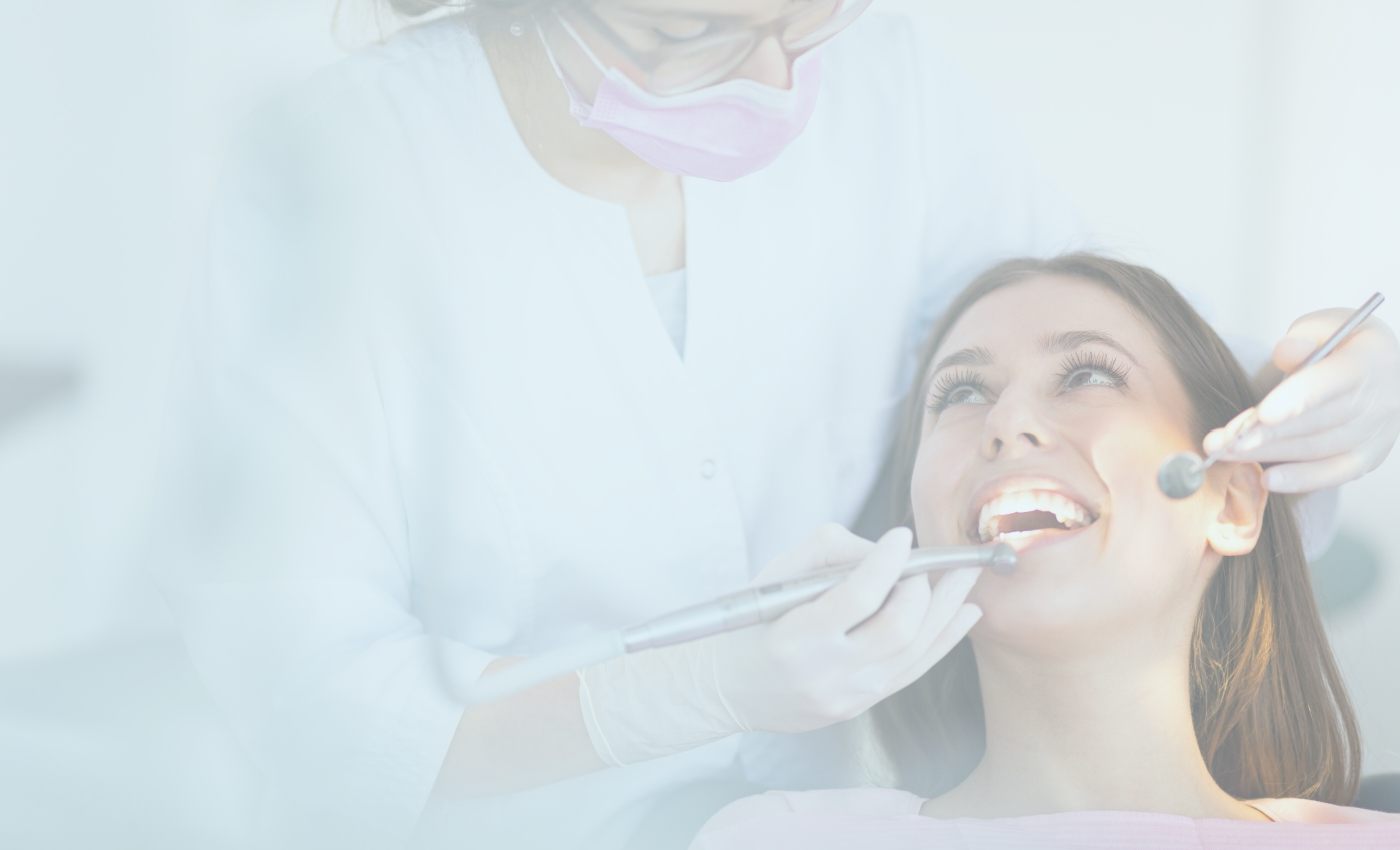 Woman receiving dentistry services in Summerfield dental office