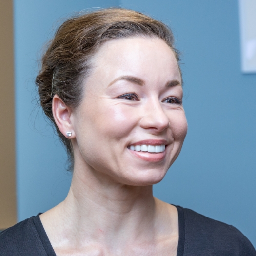 Woman smiling after inflammation reduction protocol