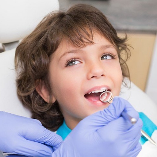 Young boy receiving children's dentistry