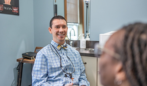 Doctor Parry smiling at a patient