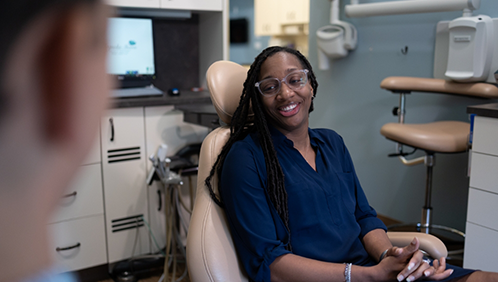 Woman smiling in the dental chair