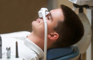 a man receiving nitrous oxide at the dentist