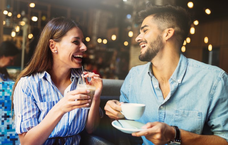 Patient smiling on date with clear aligners